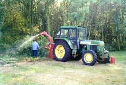 Amenity tree chipping operation in progress